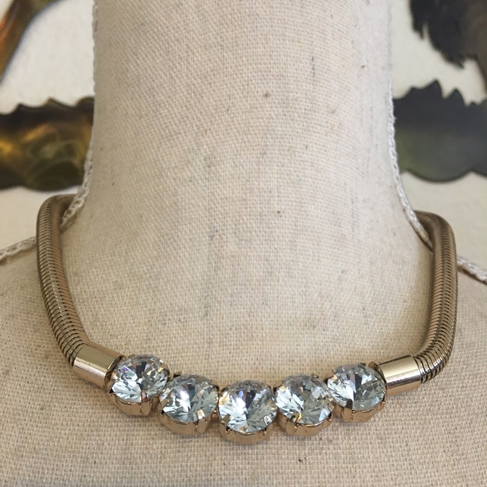 Large crystal gold tone snake chain coil necklace